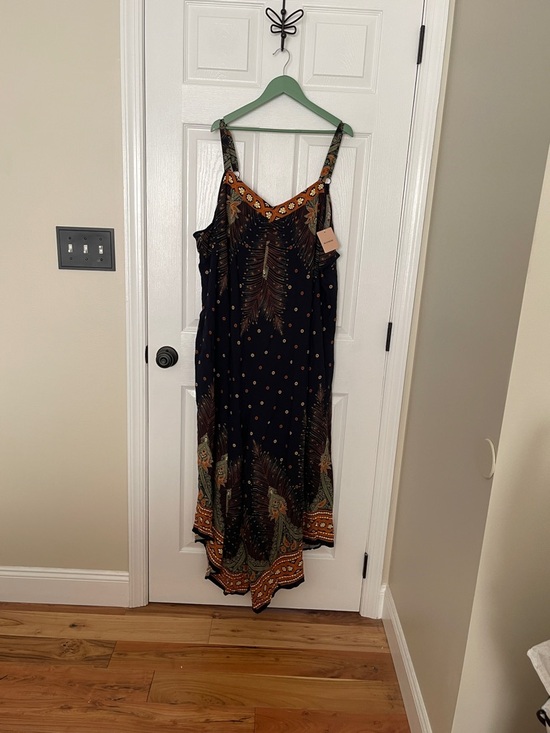 BloomChic Pants - NWT...BloomChic Navy Blue Jumpsuit with Orange & Green Print